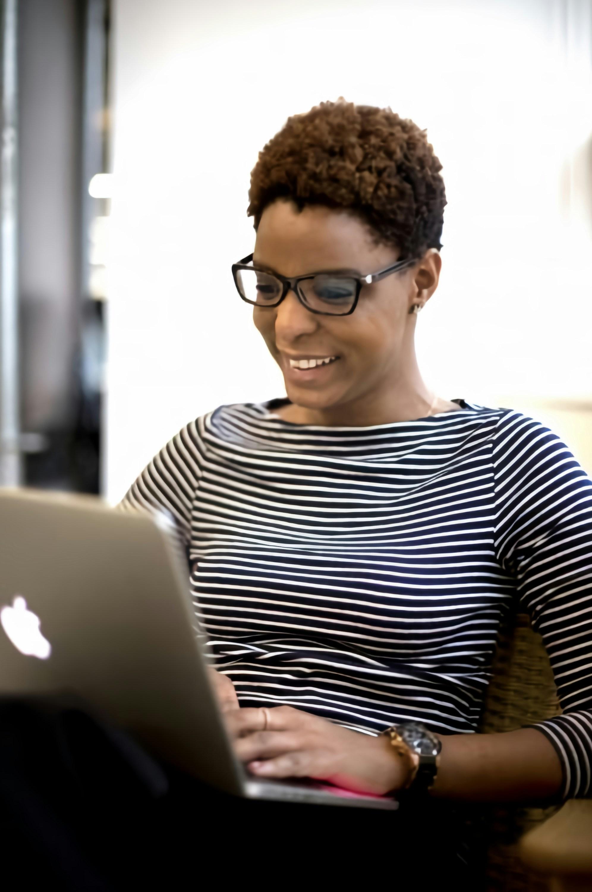 A woman using a laptop